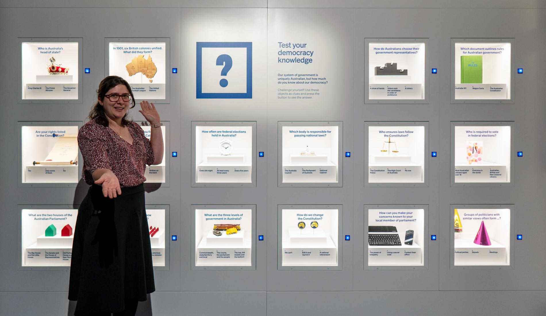A person presents in an exhibition A person presents in an exhibition